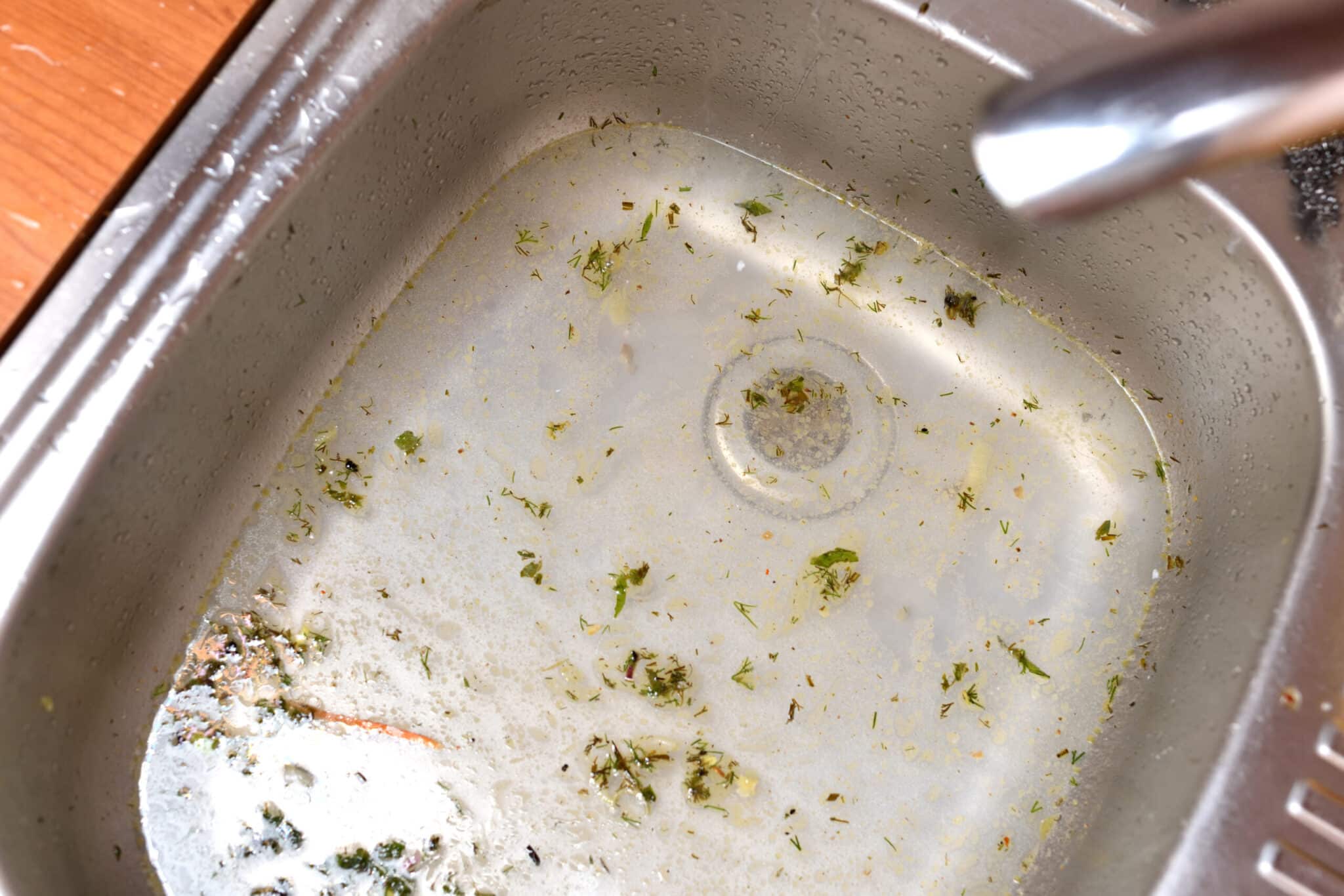 one side of my kitchen sink is clogged