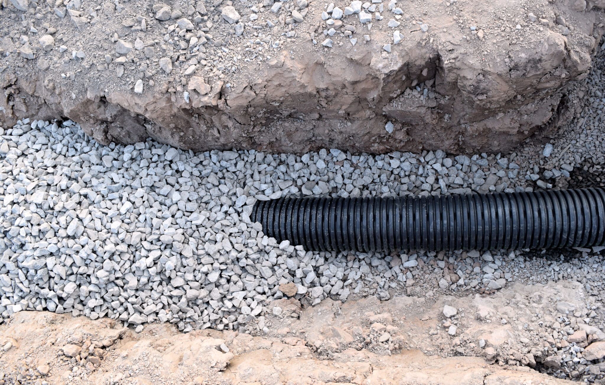 Buried Sewer Line in Road Construction Watermain Tubing Piping W